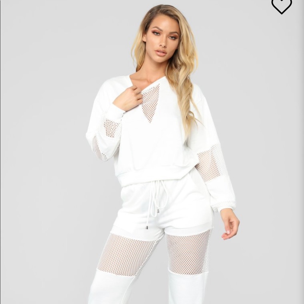 New in plastic pant/top set